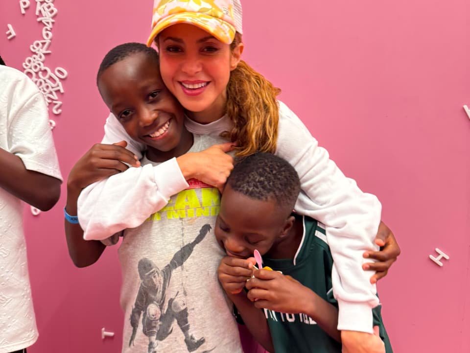 Akampulira Brighton with Shakira